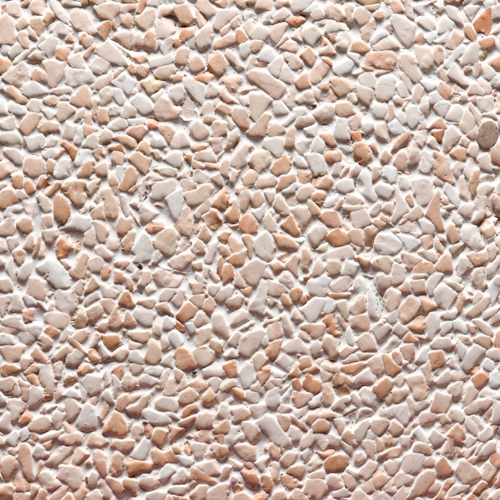 Finitura spazzolata pannelli verticali, graniglia rosa corallo, fondo bianco