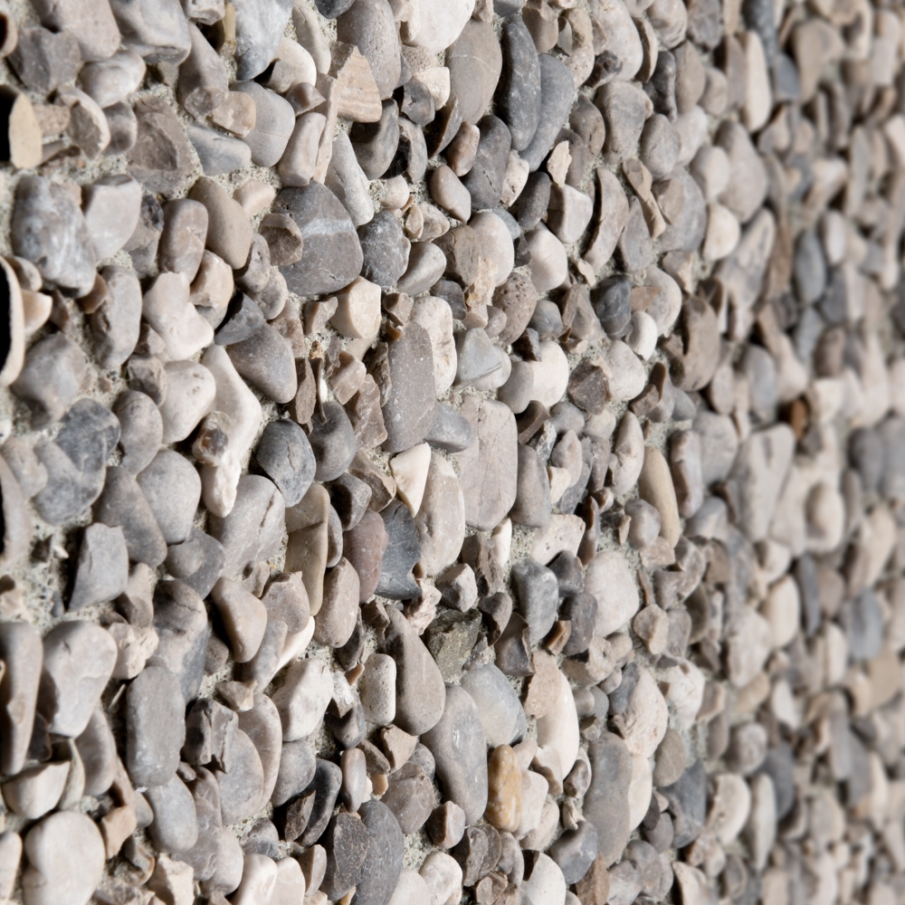 Finitura lavata pannelli verticali, graniglia sasso Aviano, fondo grigio